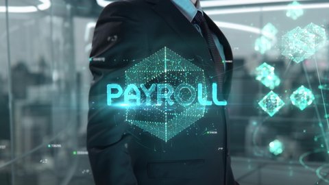 Businessman with Payroll hologram concept