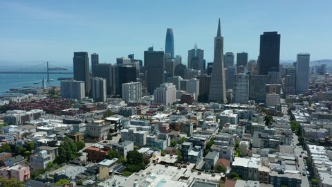 alt view of San Francisco skyline flying backward revealing Coit Tower