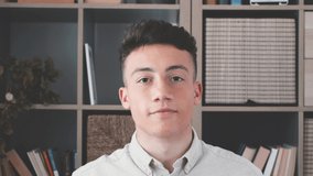 Cheerful affectionate teenager man take romantic selfie portrait looking at camera through heart of joined fingers. Enamored young lady shoot love confession to beloved man on video at Valentine day
 - Powered by Shutterstock - Get 15% off with code: PIKWIZARD15