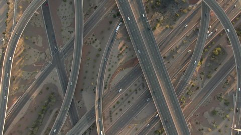 Aerial Panning Top View Of Vehicles On Bridges At Sunset, Drone Flying Forward Over Cars - Albuquerque, New Mexico