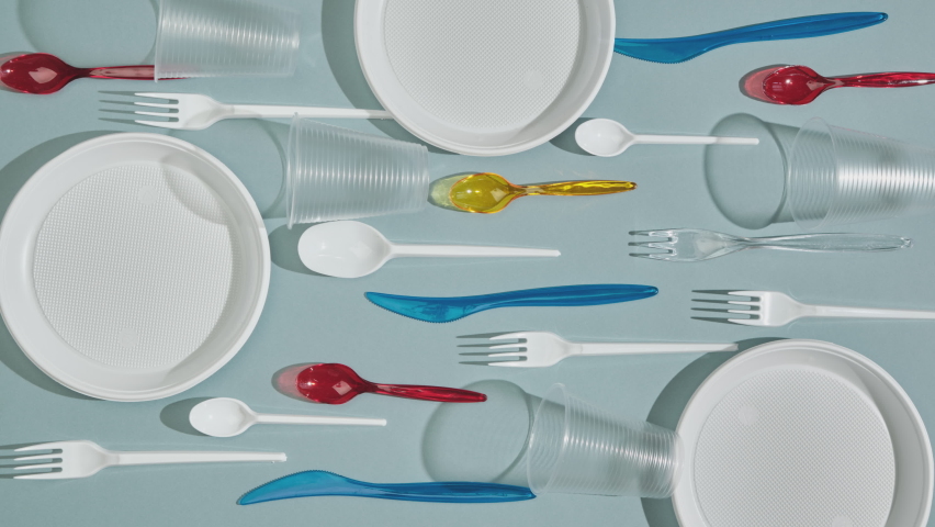 Disposable plastic and paper dishes. Biodegradable alternative to plastic. Stop motion animation. | Shutterstock HD Video #1072256291