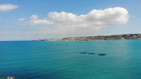 Aerial view Fish Farms in calm, blue Mediterranean sea Mellieha,Malta
