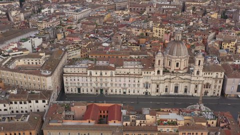 Aerial view of Piazza Navona, world famous square in Rome, Italy. Italian tourist attraction and landmark in Roma, Italia seen from drone flying in the sky