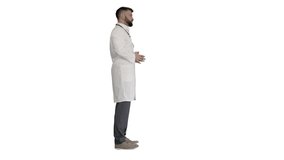 Confident doctor talking to someone on white background.