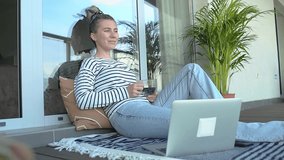 Woman relaxing in fresh air, Working from home, Spend free time on terrace. Staying connected, Social distancing, internet, chatting.