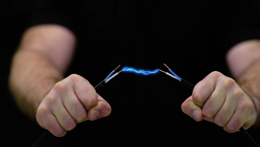 Man holds an electric wire.
Electrical spark between copper wires  Royalty-Free Stock Footage #1072293659