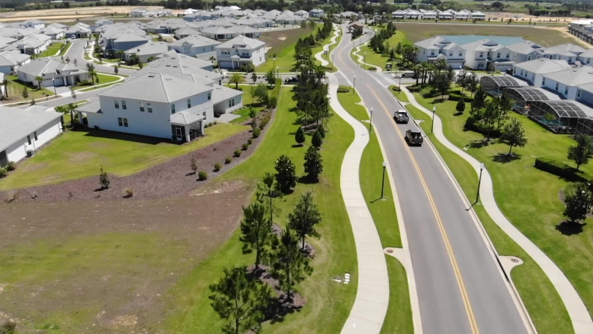Riding trucks in a town in Florida