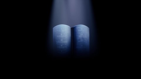Stone tablets of Ten Commandments under blue light