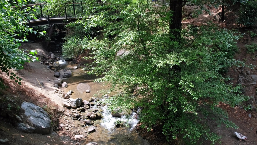 The lush greenery  around the river Clarios in the Kakopetria town. Nicosia District. Cyprus.
