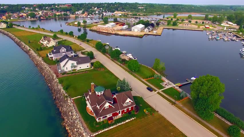 Aerial View of Kewaunee Wisconsin Harbor, Scenic Waterfront, Peninsula.
