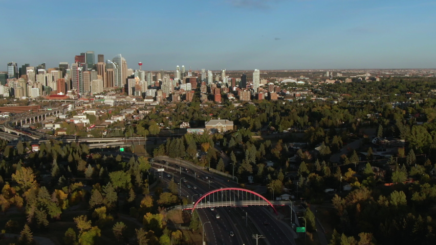 Aerial hyperlapse view of Calgary cityscape showing modern high rise buildings in the financial district during summer in Alberta, Canada.