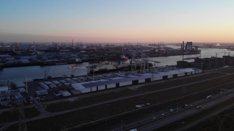 Seaport Of Maasvlakte In Rotterdam, The Netherlands During Sunset. aerial
