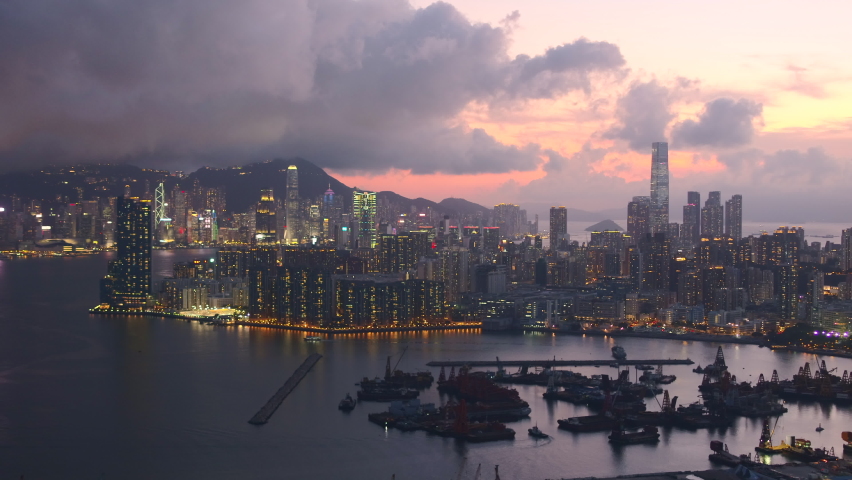 May 2021 : Hong Kong ,China ,Asia : Panorama Aerial view of Victoria Harbour in sunset 