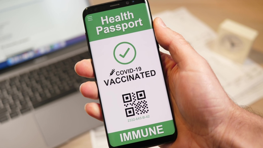 Health passport proving that the user has been vaccinated against the COVID-19. This proof allows the user to travel. Royalty-Free Stock Footage #1072362236