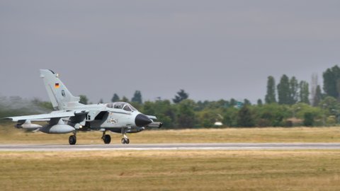 Evreux Air Base France JULY, 14, 2019 Modern Fighter Bomber Jet Aircraft Takes Off with Full Afterburner Power. Panavia Tornado IDS of German Air Force Fighter Bomber. Copy Space