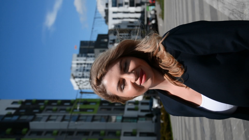 Business woman blonde city portrait