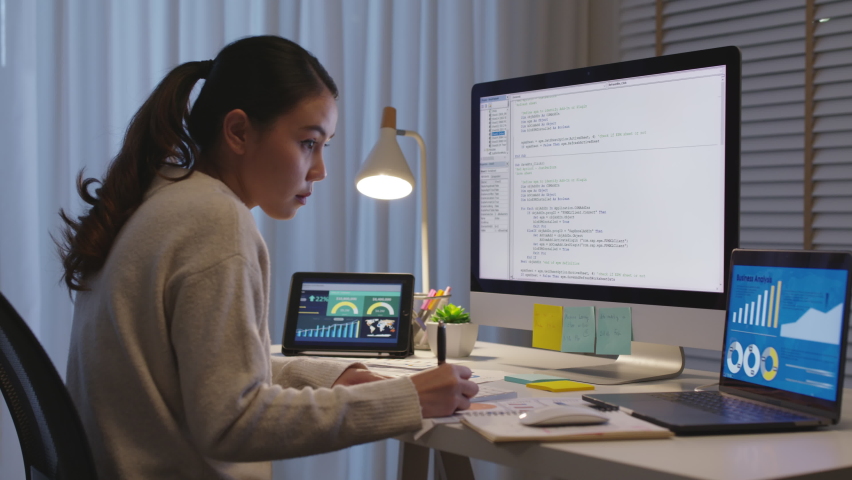 Back view young asia female people analyst coder code language multiple screen cloud online computing ai deep tech work at home office late night reskill upskill, future agile cyber ux web design job. | Shutterstock HD Video #1072382018