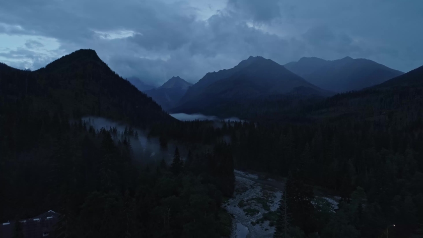 Mountain evening landscape shrouded in the fog. Jaworzyna, Slovakia