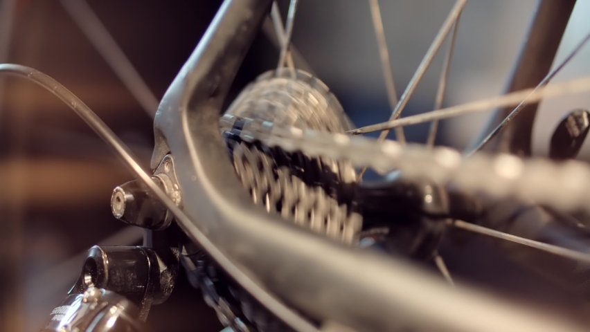 Cyclist On Bicycle Drivetrain System And Chain Rotating.Gear System 
And Bike Wheel.Cycling Drivetrain Chain Cassette And Spokes.Cyclist Pedaling Bike Endurance Exercising. Cycling Bike Wheel Rotation Royalty-Free Stock Footage #1072386422