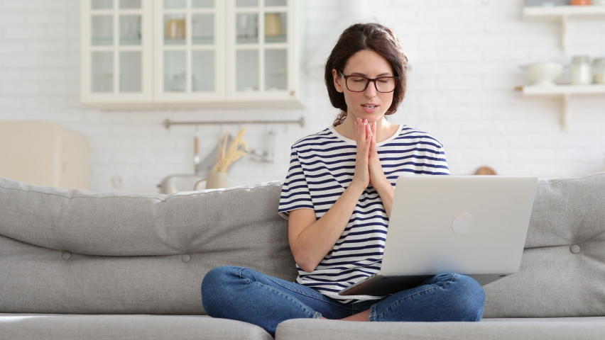 Pensive woman concentrated think on solution of business issue working remotely from home come up with great idea. Female journalist or writer get inspiration start typing response to email on laptop | Shutterstock HD Video #1072392374