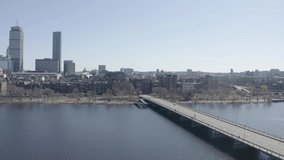 Harvard Bridge against waterfront, Back Bay, Boston cityscape. Aerial pullback