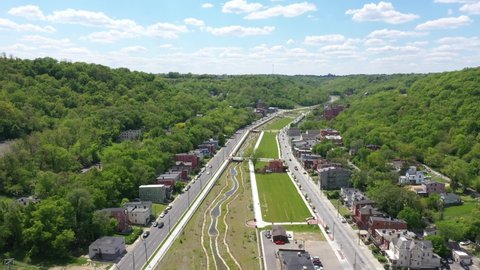 South Fairmont, Cincinnati, Ohio, USA - May 14 2021: 4K Drone aerial shot of Lick Run Greenway park in South Fairmont, in Cincinnati, Ohio. An MSD project separates stormwater from sewage.