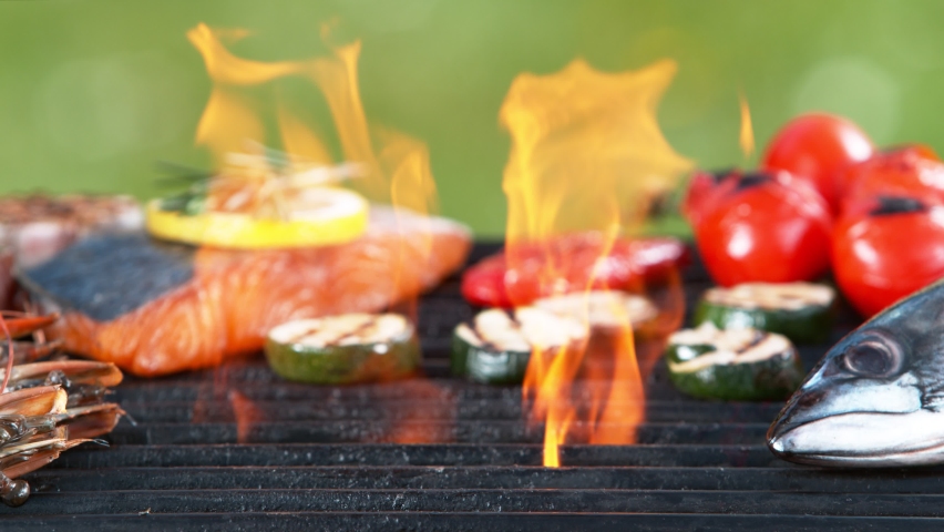 Super slow motion of falling octopus tentacle on grill grid. Filmed on high speed camera, 1000 fps