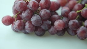 Panning shot fresh seedless grapes. Slow motion shot
