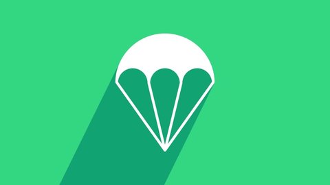 White Parachute icon isolated on green background. Extreme sport. Sport equipment. 4K Video motion graphic animation.