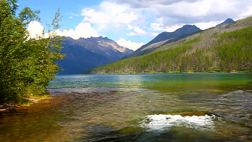 Cascading waters of Kintla Creek as it flows out of Kintla Lake in Glacier National Park