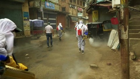 Srinagar Jammu and Kashmir India May 05 2021. Second wave of coronavirus in india Kits white Frontline workers in india covid 2021, wearing dress helping societies people to come out from coronavirus 