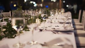 Wedding decor beach set up candle catering dinner dish luxury event. Festive fine setting table row chair flower reception party. birthday,Christmas, Valentine, honeymoon . - Powered by Shutterstock - Get 15% off with code: PIKWIZARD15