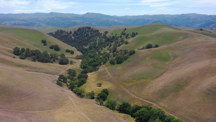 Scenic, grass-covered hills dominate the landscape in the Tri-valley, not far east of San Francisco Bay. This warm region of Dublin, Pleasanton, and Livermore harbors wineries and many parks.
