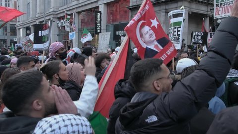 LONDON, UK – May 15, 2021: Crowd chants “From the river to the sea, Palestine will be free” at free Palestine protest at Embassy of Israel in London, England, UK
