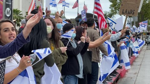 Demonstrators take part in a protest outside the Federal Building against Palestine and in support of Israel, Sunday, May 16, 2021 in Los Angeles. 