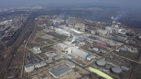 Chemical processing plant. Aerial view of Modern high-tech production. A giant chemical plant. A huge oil refinery with pipes and distillation of the complex.	