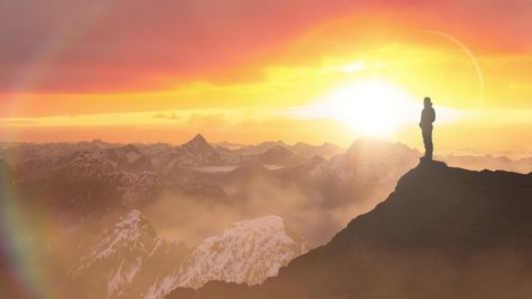 Magical Fantasy Adventure Composite of Man Hiking on top of a rocky mountain peak. Background Landscape from British Columbia, Canada. Sunrise Dramatic Colorful Sky. Parallax Animation