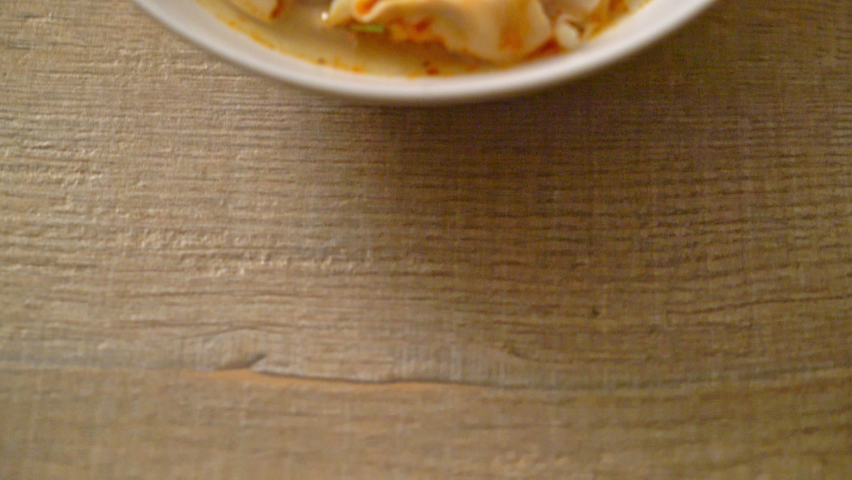 pork wonton soup or pork dumplings soup with roasted chili - Asian food style