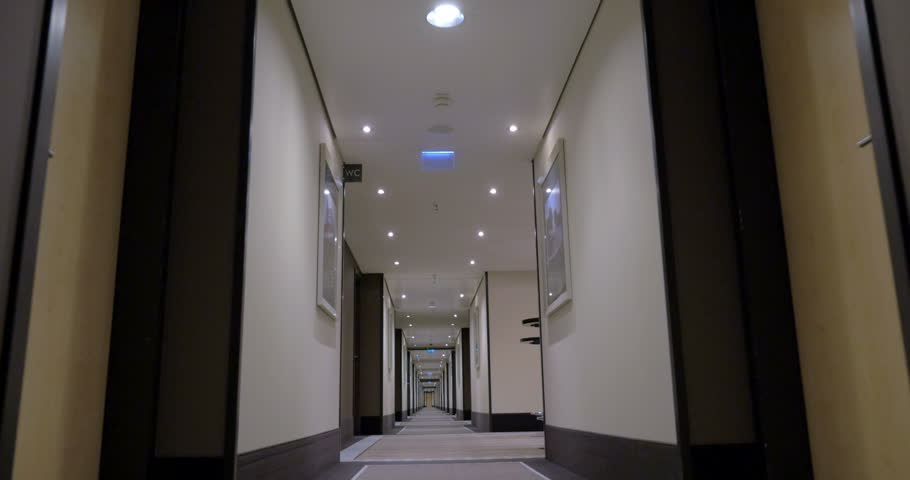 Timelapse of moving along the modern hotel passage.