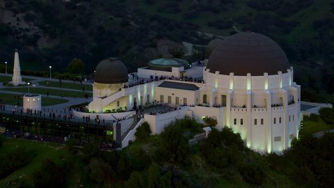 
Los Angeles, California, circa 2019: Amazing view of the Griffith Observatory in Mount Hollywood full of people. Los Angeles, California. Shot in 8K.