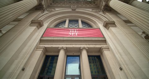 New York , New York  United States - May 4,  2021: The Metropolitan Museum of Art exterior, wide, low angle pan up of front entrance