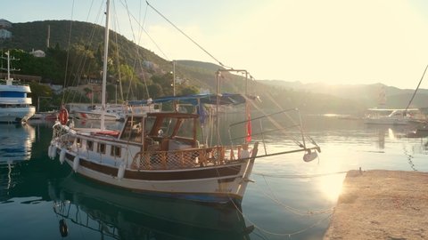 Kas, Turkey - December 3, 2020: Sailboat in the marina of Kas town, Antalya, Turkey