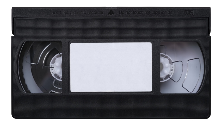 Looping Retro Video Cassette Tape (VHS) As It Plays Royalty-Free Stock Footage #1072631588