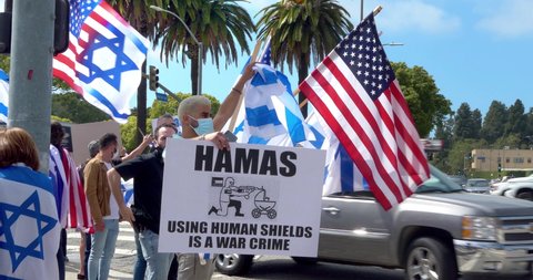 LOS ANGELES, CALIFORNIA, USA - MAY 12, 2021: Israel supporters protest against Palestine Hamas militant terrorist group governing Gaza, Los Angeles, California, 4K