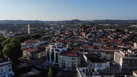 Viseu, Portugal - May 8, 2021: DRONE AERIAL FOOTAGE - Panoramic cityscape view of Viseu in Portugal.