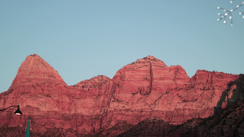 light of the sunset on red mountains