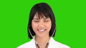 Chromakey footage of a chinese nurse with a stethoscope looking at the camera, Healthcare workers in the Coronavirus Covid19 pandemic