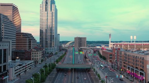 Cincinnati, Ohio, USA - May 18 2021: 4K Drone aerial footage of downtown Cincinnati, Ohio. Flying over the highway underpass of 71, 75, 471.