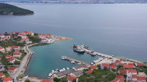 Fishing Boats Docked On Small Harbor Of Kali On Ugljan Island In Zadar County, Croatia. - aerial