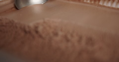 Close Up Slow Motion Scooping ice cream Chocolate flavor meat.